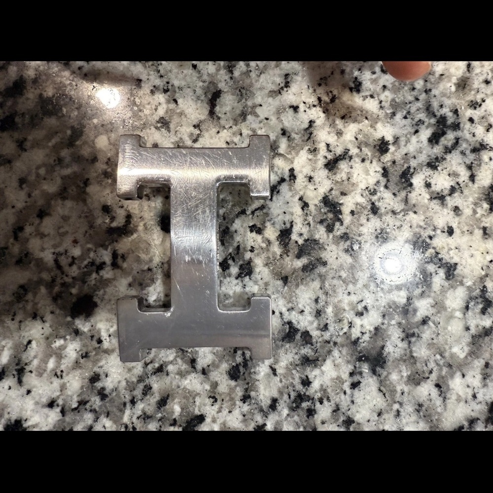 Inspired belt buckle